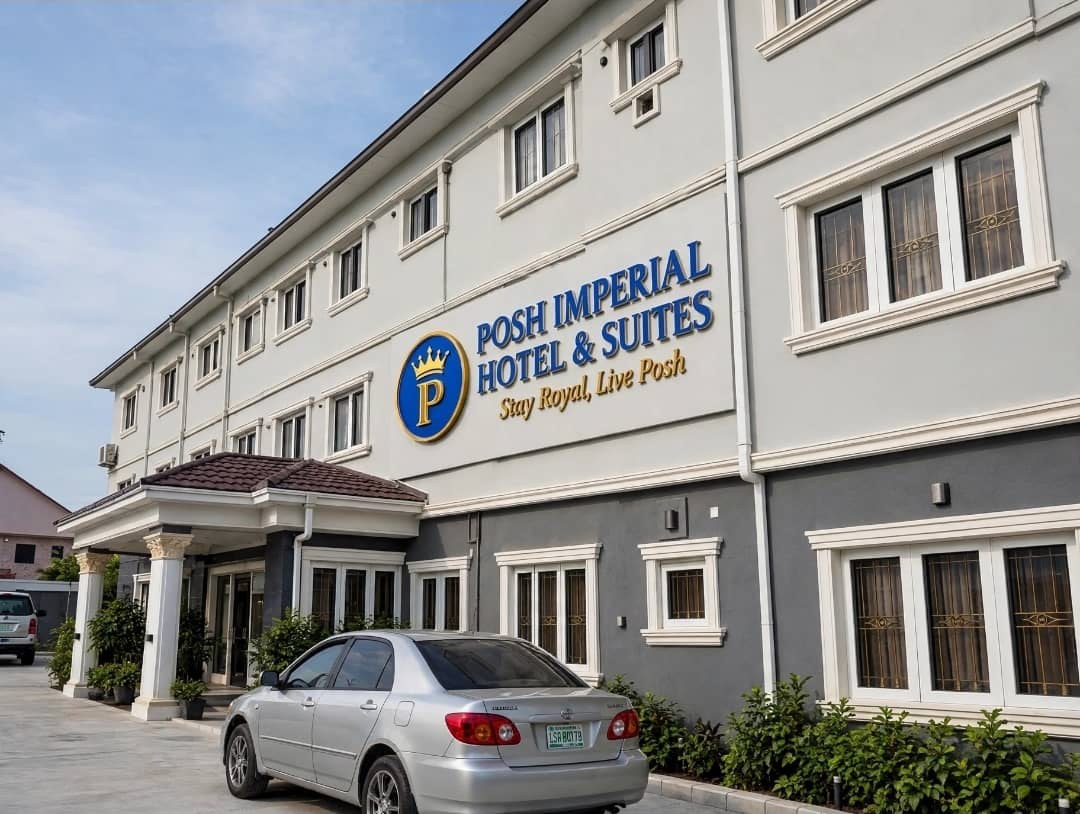 Posh Imperial Hotel & Suites entrance in daylight